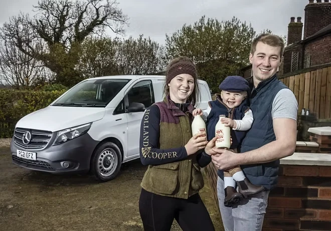 Annie and John with their son beside the Fiddlers delivery van